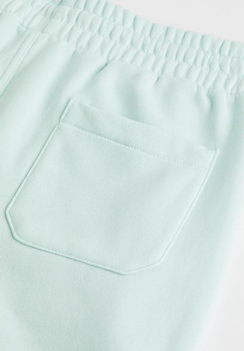 H&M - Regular fit sweatshirt shorts - light turquoise