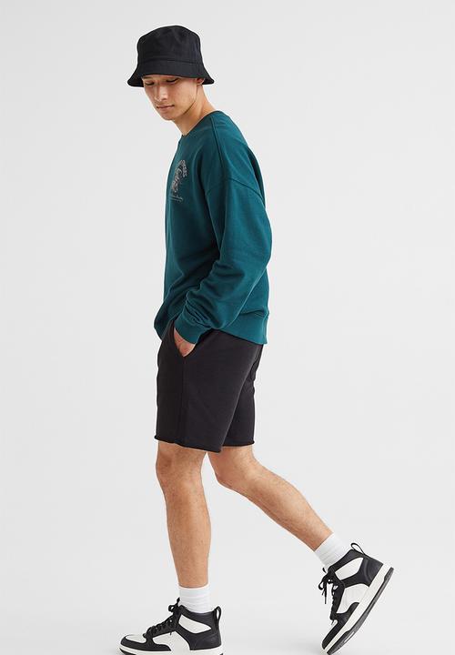 H&M - Regular fit sweatshirt shorts - black