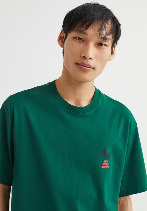 H&M - Relaxed fit T-shirt - dark green/new sound studio