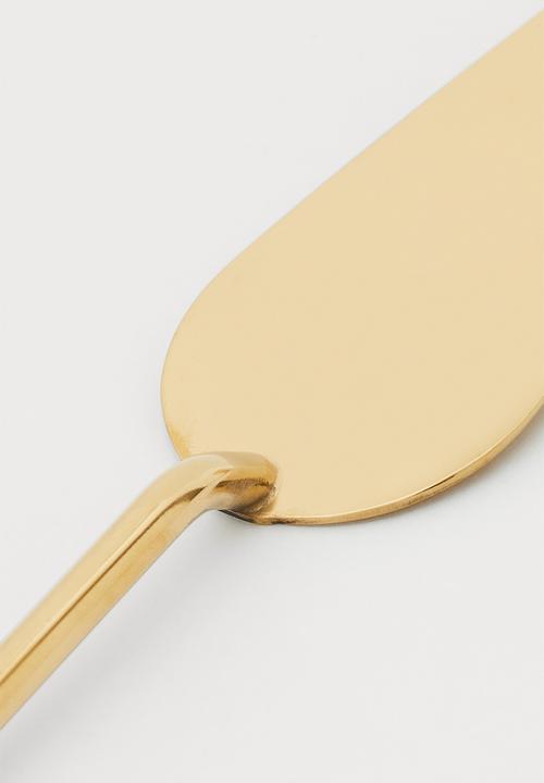 H&M - Metal cake slice - gold