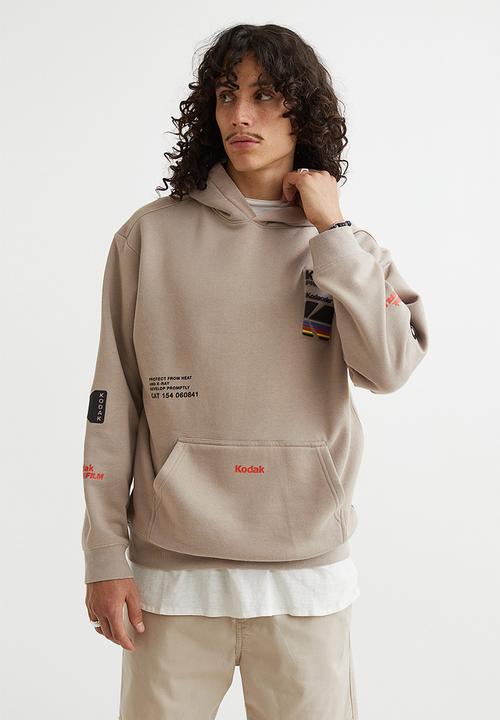 H&M - Relaxed fit hoodie - beige/kodak