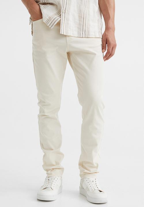 H&M - Slim fit cotton twill trousers - cream