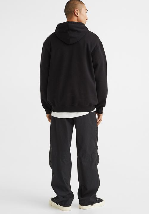 H&M - Relaxed fit belted trousers - black