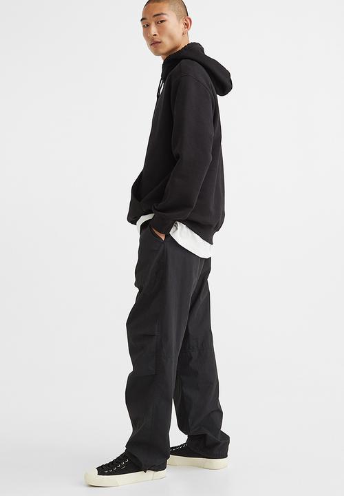 H&M - Relaxed fit belted trousers - black