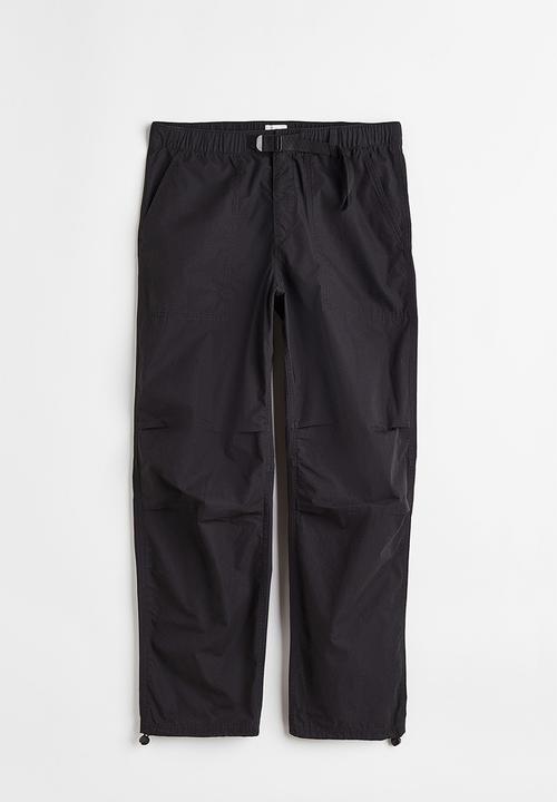 H&M - Relaxed fit belted trousers - black