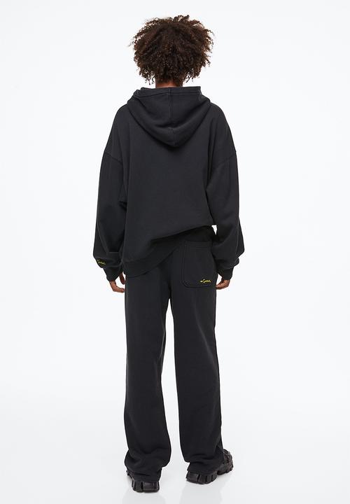 H&M - Loose fit cotton sweatpants - black/the simpsons
