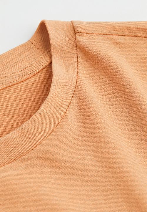 H&M - Regular fit round-neck T-shirt - light orange