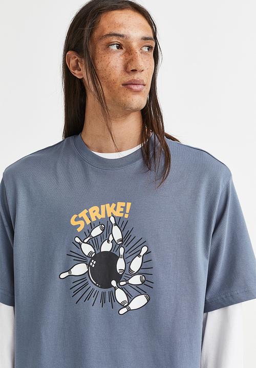 H&M - Relaxed fit printed T-shirt - dark blue/strike