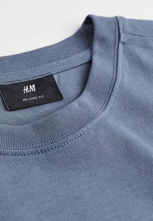 H&M - Relaxed fit printed T-shirt - dark blue/strike