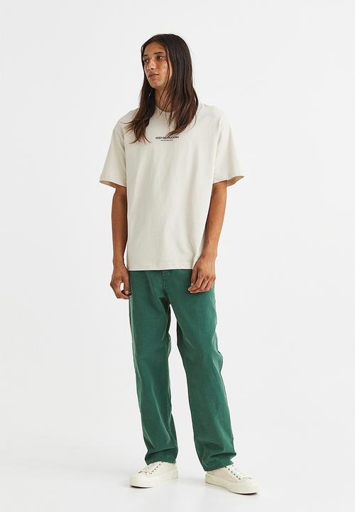 H&M - Relaxed fit printed T-shirt - light beige/trucking