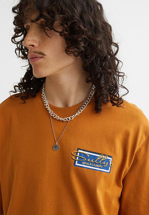 H&M - Relaxed fit printed T-shirt - mustard yellow/sully's