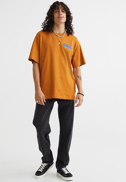 H&M - Relaxed fit printed T-shirt - mustard yellow/sully's