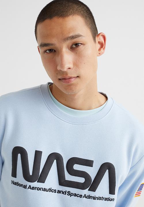 H&M - Printed sweatshirt - light blue/nasa