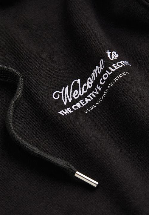 H&M - Regular fit printed hoodie - black