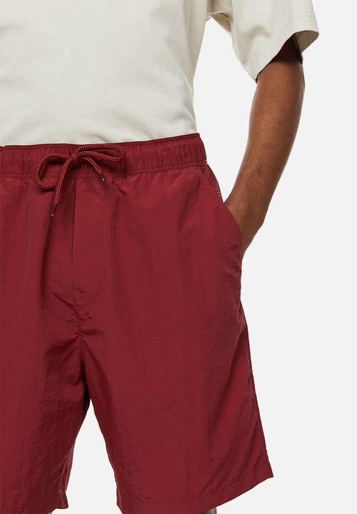H&M - Relaxed fit nylon shorts - red