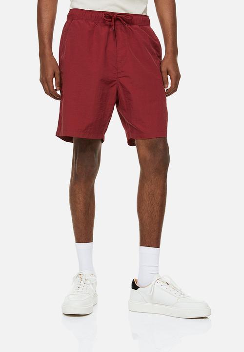 H&M - Relaxed fit nylon shorts - red