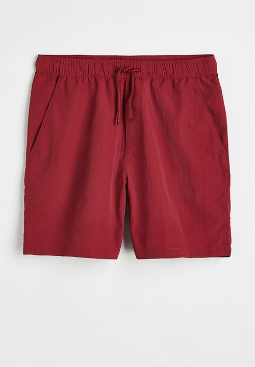 H&M - Relaxed fit nylon shorts - red