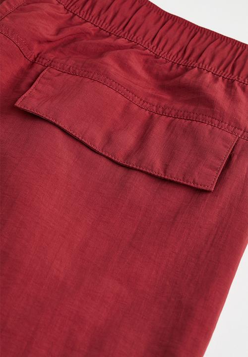 H&M - Relaxed fit nylon shorts - red