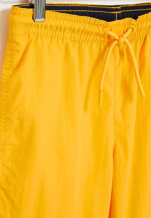 POLO - Boys active short - yellow
