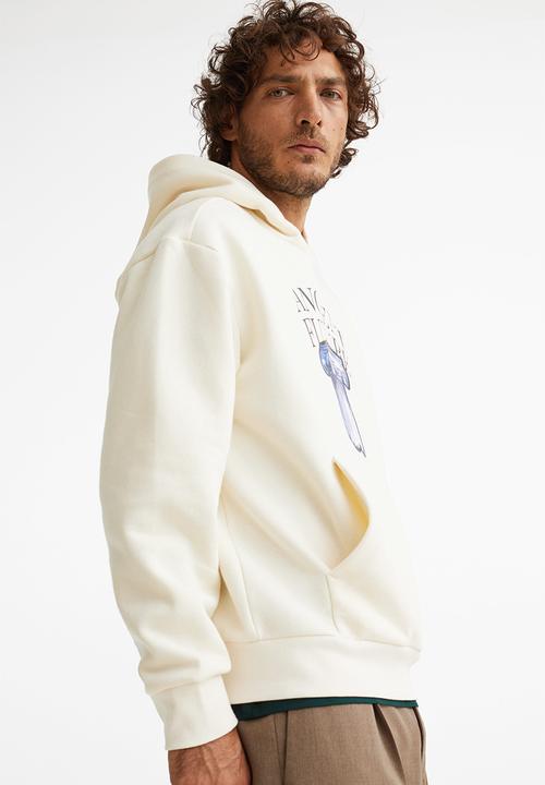 H&M - Relaxed fit hoodie - cream/ancient future