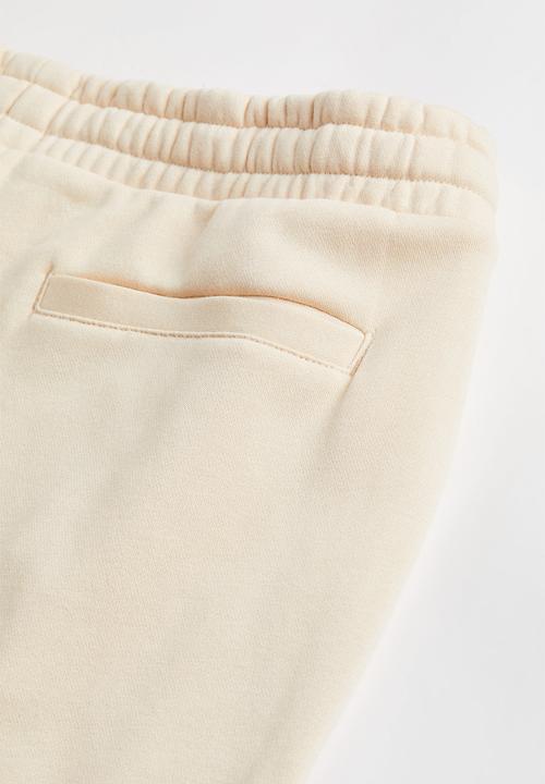 H&M - Slim fit sweatpants - cream