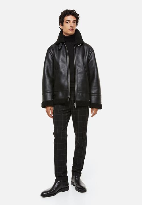 H&M - Slim fit trousers - black