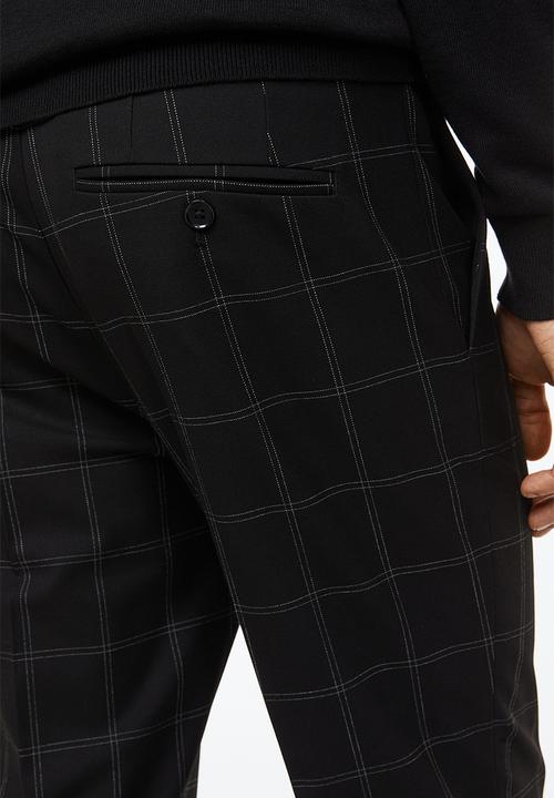 H&M - Slim fit trousers - black