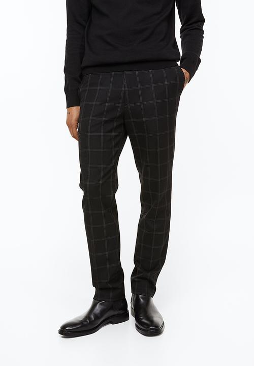 H&M - Slim fit trousers - black