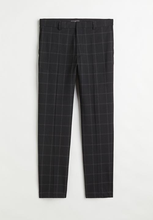 H&M - Slim fit trousers - black