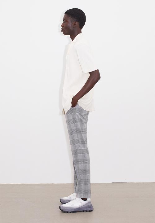 H&M - Slim fit trousers - grey/checked