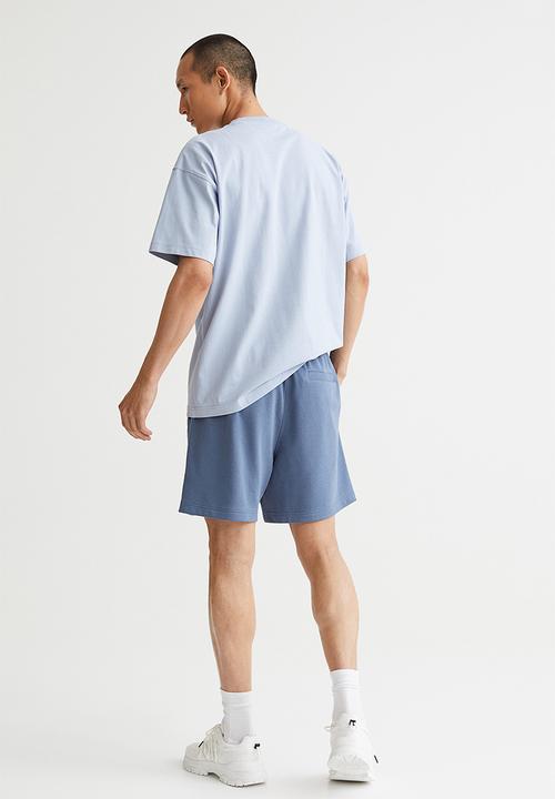 H&M - Relaxed fit sweatshirt shorts - pigeon blue/new beginnings