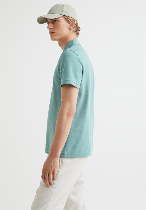 H&M - Slim fit coolmax® polo shirt - turquoise