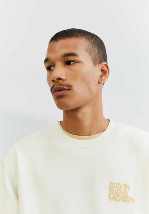 H&M - Relaxed fit sweatshirt - cream/slow motion