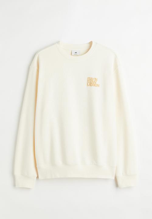 H&M - Relaxed fit sweatshirt - cream/slow motion