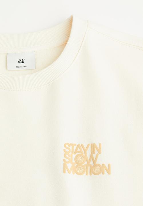 H&M - Relaxed fit sweatshirt - cream/slow motion