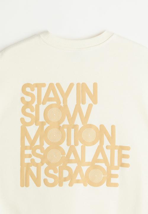 H&M - Relaxed fit sweatshirt - cream/slow motion