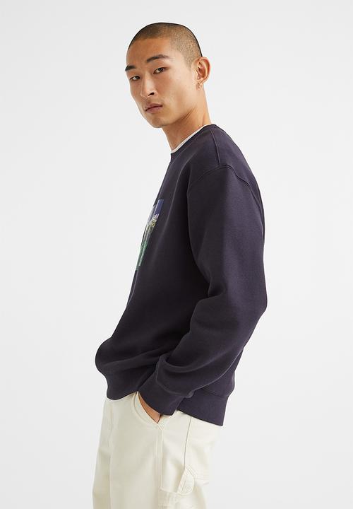 H&M - Relaxed fit sweatshirt - dark blue/head for the hills