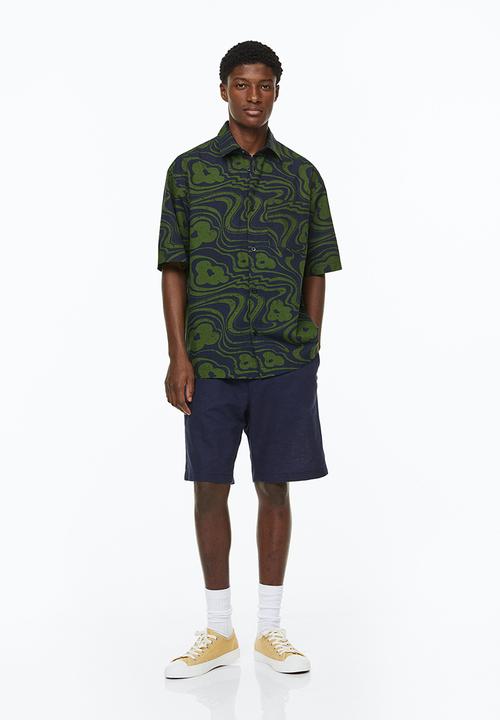 H&M - Relaxed fit short-sleeved shirt - dark blue/floral