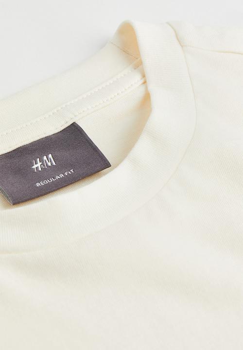 H&M - Regular fit cotton T-shirt - cream/valencia