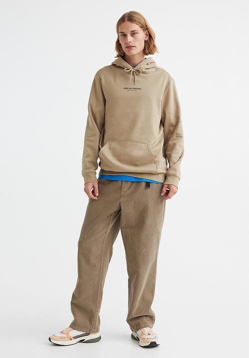 H&M - Regular fit hoodie - beige/keep on trucking