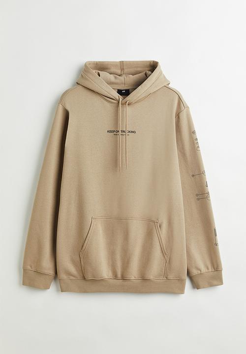 H&M - Regular fit hoodie - beige/keep on trucking
