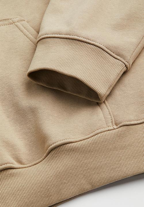 H&M - Regular fit hoodie - beige/keep on trucking