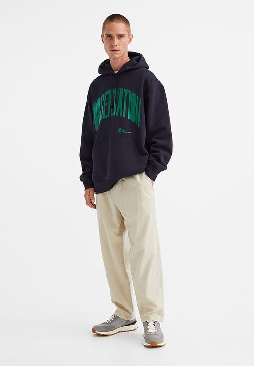 H&M - Relaxed fit hoodie - dark blue/observation