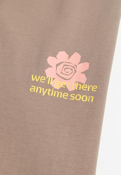 H&M - Relaxed fit cotton T-shirt - dark beige/flower
