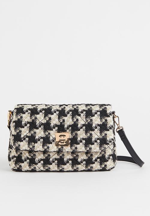 H&M - Small crossbody bag - black/dogtooth patterned
