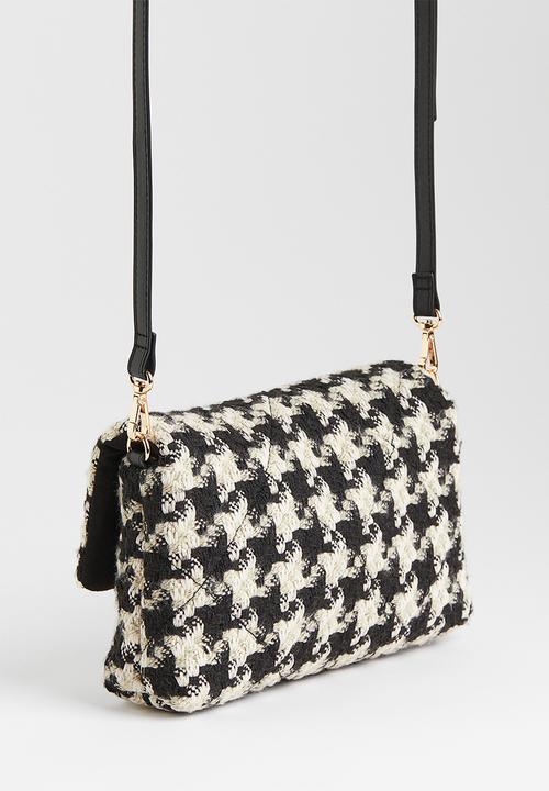 H&M - Small crossbody bag - black/dogtooth patterned