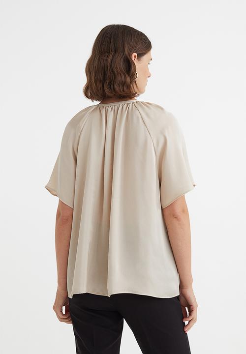 H&M - Short-sleeved tie-detail blouse - light beige