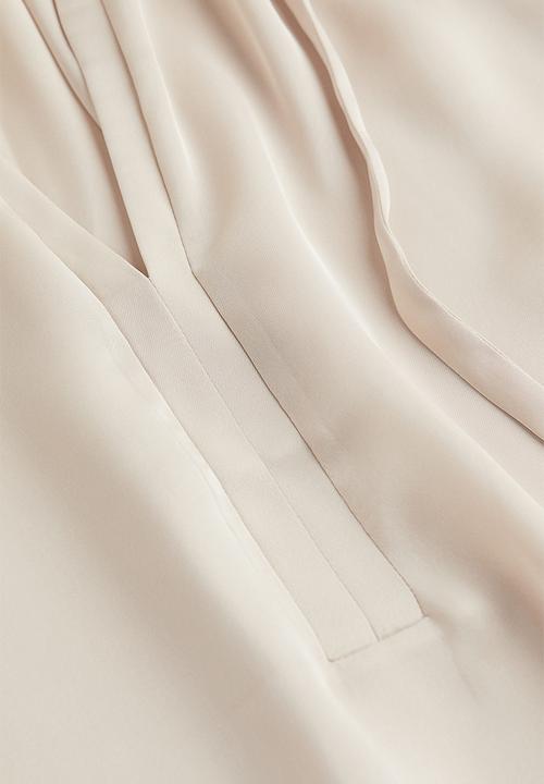 H&M - Short-sleeved tie-detail blouse - light beige