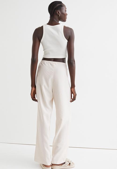 H&M - Wide satin trousers - white