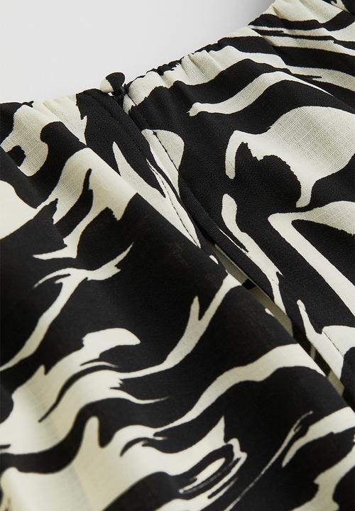 H&M - Patterned balloon-sleeved blouse - black/zebra print